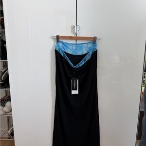 Top or skirt or set dr tiger mist